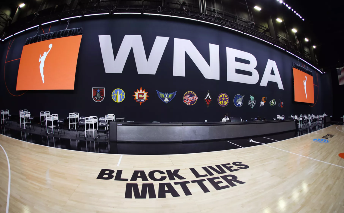 A WNBA court painted to read Black Lives Matter